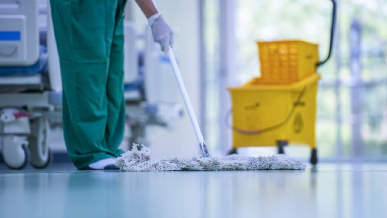 Blurred hospital images, Clean and sanitize, Cleaner, Hospital cleaning,Cleaning the hospital floor. Floor care and cleaning services with washing mop in sterile factory or clean hospital.